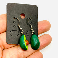 Avocado Earrings made of natural clay and hand painted. Drop and dangle. Mexican jewelry food. Mexico folk art to wear. Aretes de aguacate pintados a mano para mujer. Fridamaniacs, Frida kahlo inspired wearable art and accessories