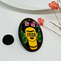 Gorgeous Frida Kahlo enamel oval pin with pink and white flowers for women and girls by Fridamaniacs Jewelry and accessories