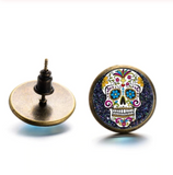 Colorful sugar skull rustic bronze stud cabochon earrings. Mexican jewelry. Handmade Mexico folk art accessories. Aretes calavera para mujer. Day of the dead Dia de los Muertos inspired Frida Kahlo