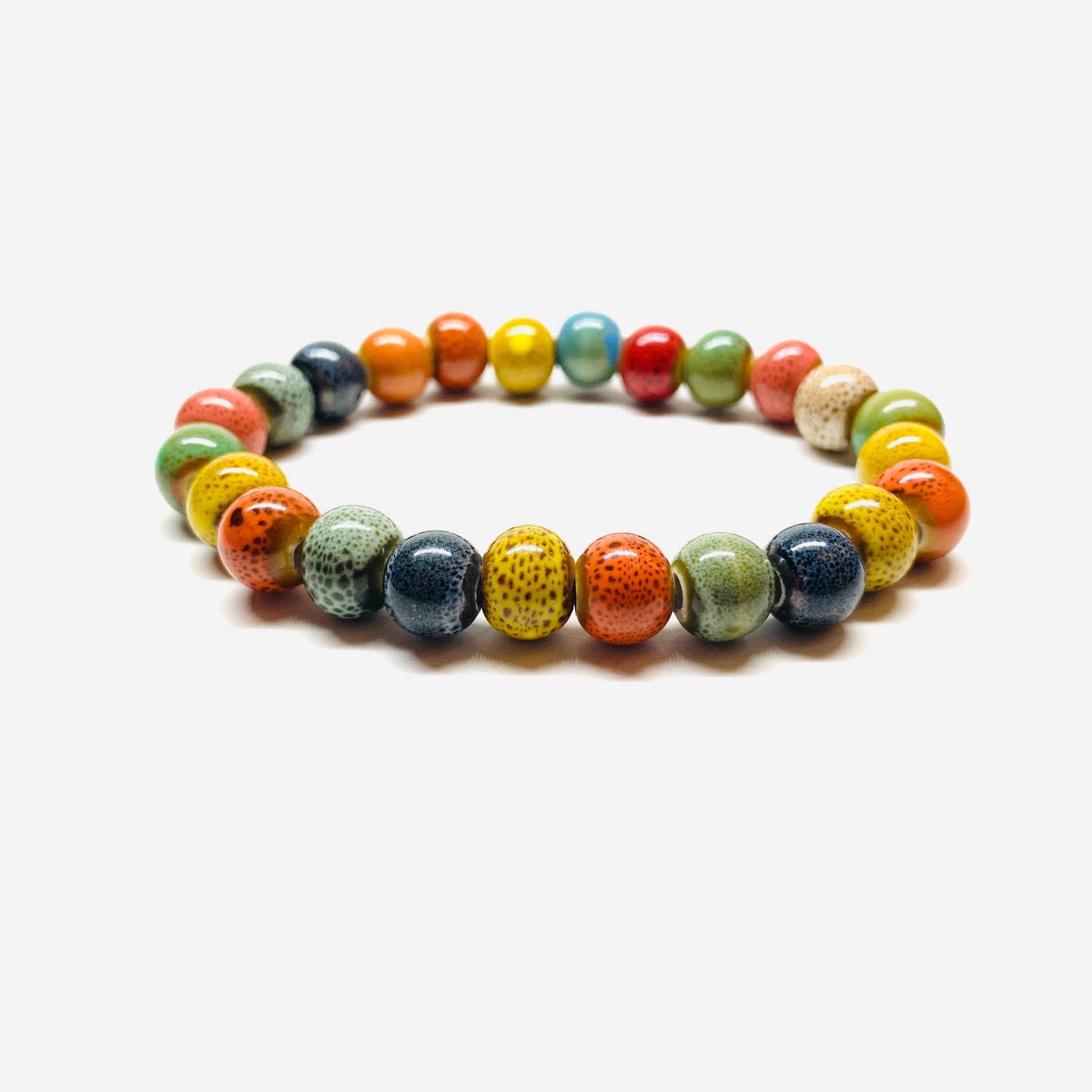 ceramic bracelet made of multicolored beads and designed by Mexican artisans. Unisex clay wristband. Fridamaniacs. Frida Kahlo inspired
