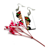 Frida earrings: Frida Kahlo inspired handpaied wooden earrings. Mexican jewelry by Fridamaniacs