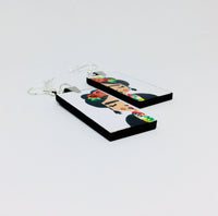 Frida earrings: Frida Kahlo inspired handpaied wooden earrings. Mexican jewelry by Fridamaniacs