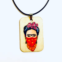 Frida Kahlo hand painted and handmade wood necklace pendant with a feminist fashion style. Mexican Jewelry. Collar pintado a mano inspirado en Mexico Frida painter para mujer
