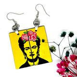 Frida Kahlo Stencil Art with Yellow Background and Hand Painted Pink Roses. Wearable art for girls. Cute and original gift idea. Floral jewelry inspired Mexican Artist and Mexico Folk Art. Aretes Frida Kahlo Amarillos con Rosas para Mujer.