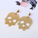 Metallic skull earrings. Mexican jewelry. Gold tone aretes de calavera