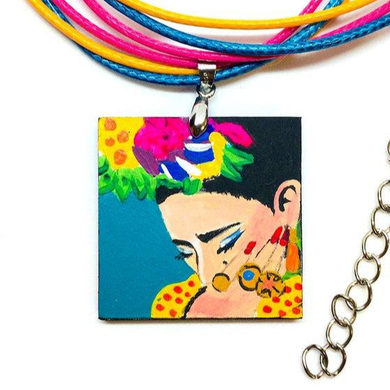 Frida Kahlo hand painted necklace pendant with colorful flowers and bright yellow dress. Wearable Art. Mexican Jewelry. Collar Pintado a mano