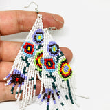 Beaded Mexican earrings Handmade with white, purrple, yellow, red, green and black floral pattern beads. Frida Kahlo inspired jewelry mexico folk art.