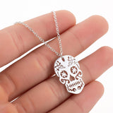 Silver Sugar Skull Necklace Pendant: Mexican Silver Sugar Skull necklace pendant for girls by fridamaniacs and fridalovers. Skull jewelry inspired by Mexico and Frida Kahlo. Collar de Calavera de azucar plateada