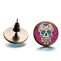 Bright pink sugar skull stud cabochon earrings. Mexican folk art jewelry. Skull-Skeleton accessories. Dia de los muertos joyeria mexicana. Aretes calaveras de azucar para mujer