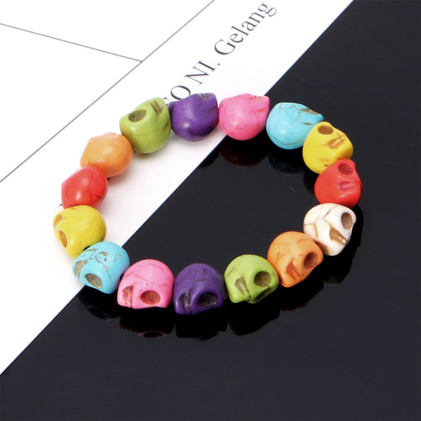 Multicolored natural stone skull beads wristband bracelet set. Mexican Day of the Dead or Dia de los Muertos joyeria brazaletes. Unisex halloween accessories