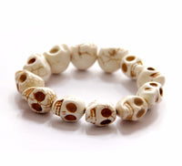 Skull bracelet made of natural stone beads by fridamaniacs day of the dead jewelry and accessories. Mexican jewelry. Brazalete de calaveras. Mexico folk art