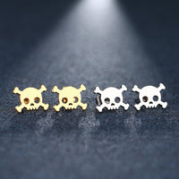 Mexican silver and gold skull earrings. Mini stud silver pendants by fridamaniacs jewelry and accessories