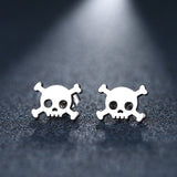 Mexican silver skull earrings. Mini stud silver pendants by fridamaniacs jewelry and accessories