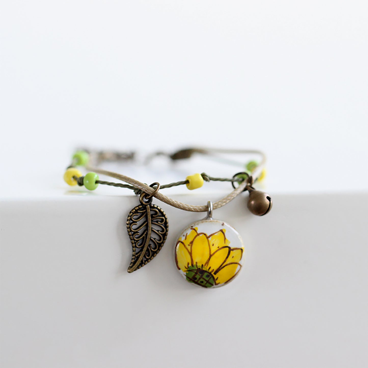 Sunflower Clay Bracelet: Hand painted and handmade ceramic sunflower wristband bracelet for women and girls inspired by Frida Kahlo and Mexican Folk Art Jewelry
